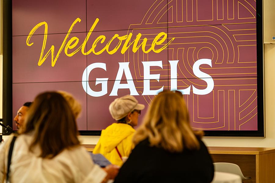Homecoming 2025, digital board in LaPenta School of Business with the words, "Welcome Gaels."