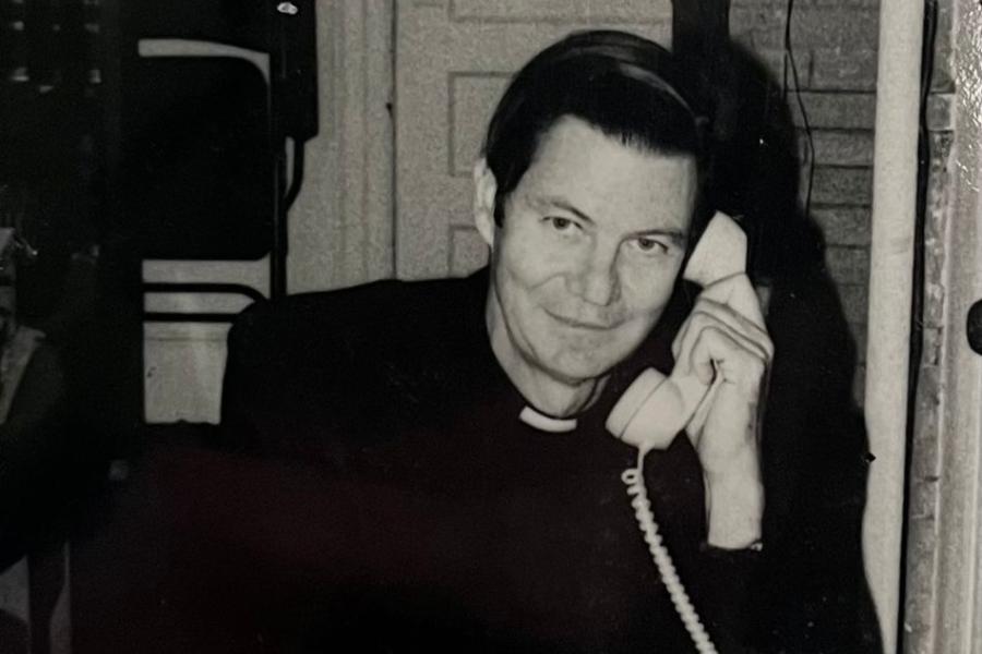 Br. Cussen on telephone