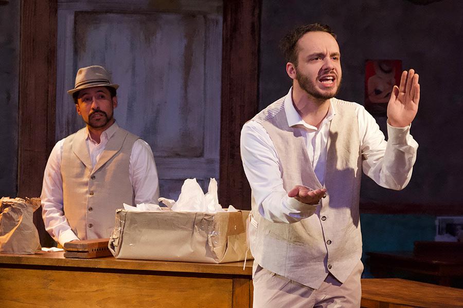 A male actor gestures with his hands in Anna in the Tropics.
