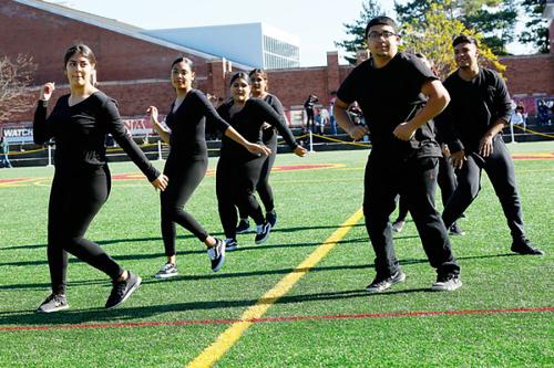 Bailando Con Sazon perform on Mazzella Field.