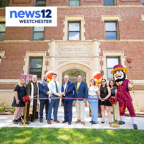 The Bohm Hall ribbon cutting with News12 logo.