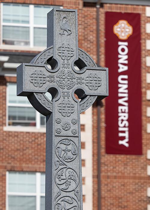 The Celtic Cross with the Iona banner.
