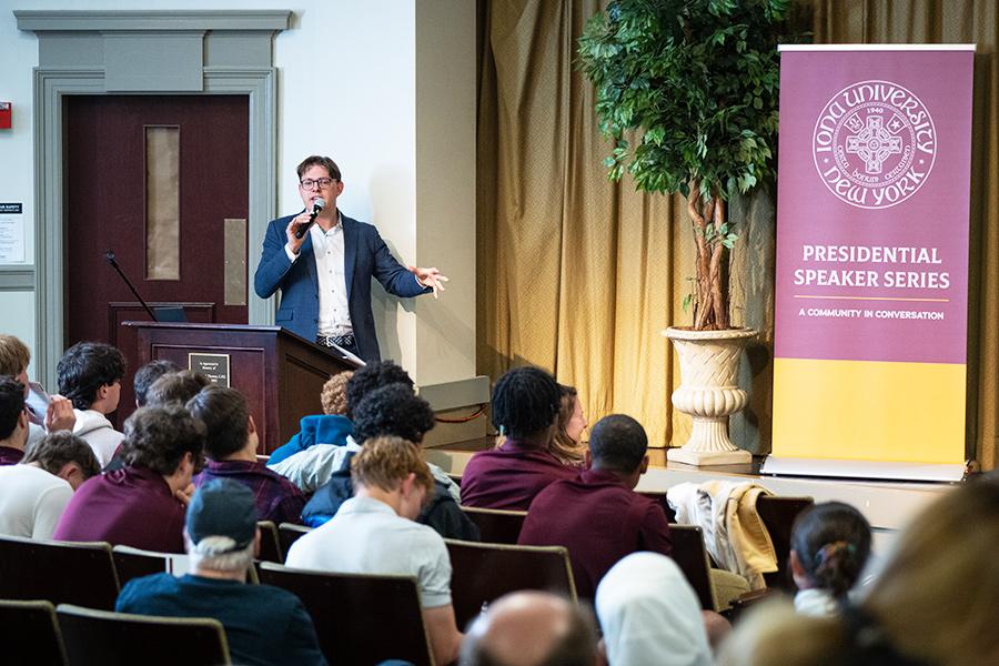 Tom Chatfield speaking in Romita Auditorium.