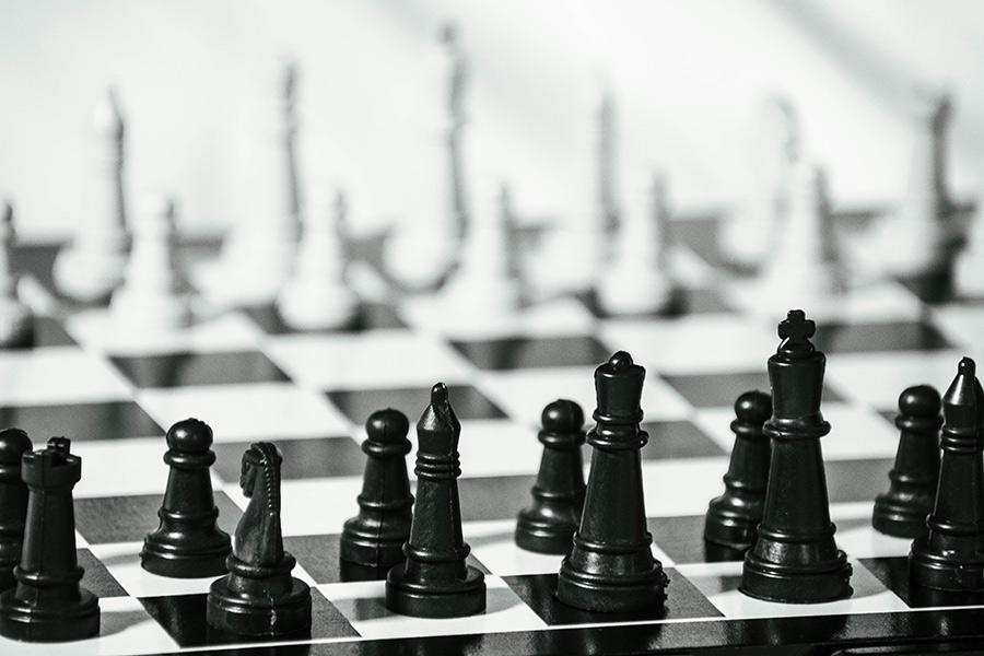 A chess board and pieces.