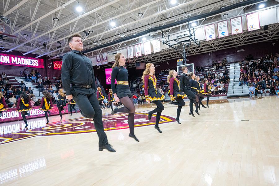 Tommy Byrnes ’26 dancing with the Irish Dance Team in the Iona University gymnasium for an event.
