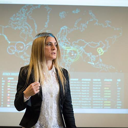 A professor teaches a cyber security class.
