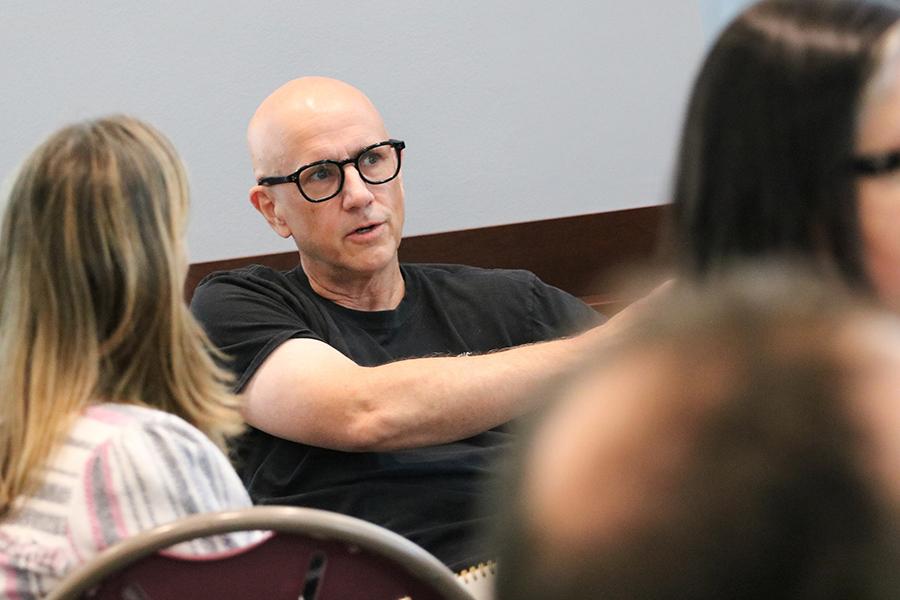 Dean DeFino leading a discussion with students.