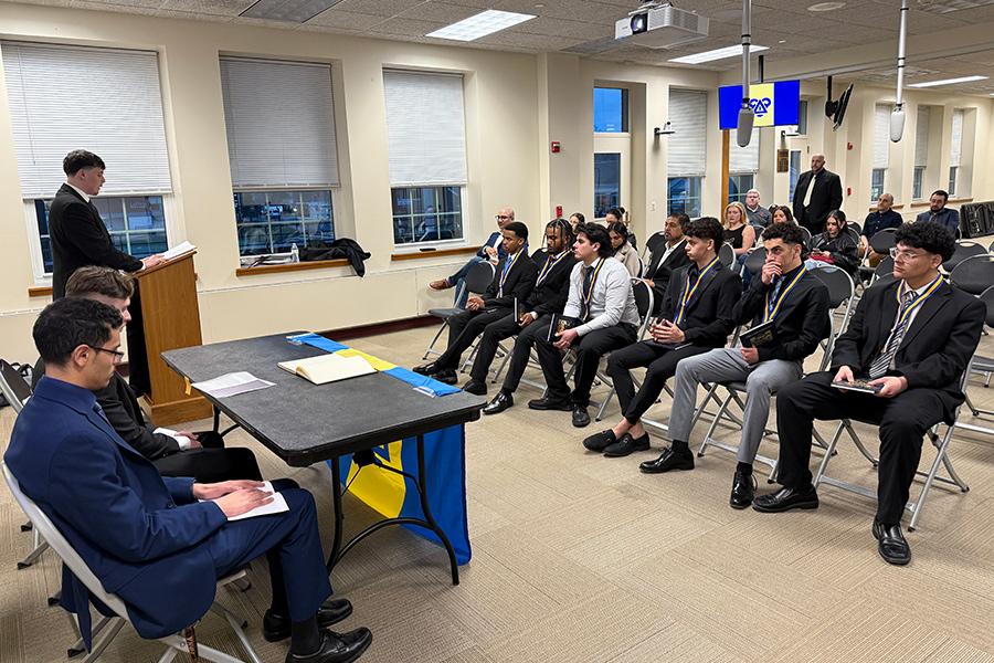 A Delta Upsilon meeting in the LaPenta Student Union.