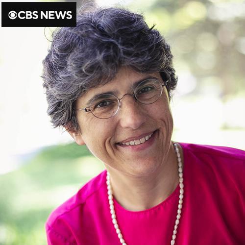 Elena Procario Foley with the CBS logo.