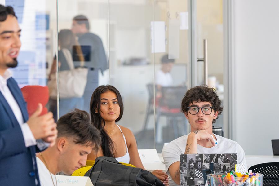 An entrepreneurship class with students paying close attention.
