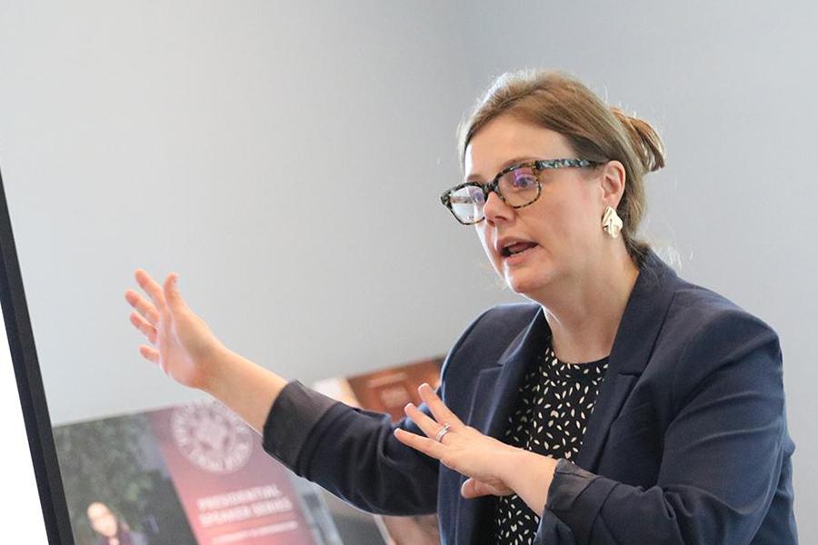 Christine Hardigree presenting at a GCTL meeting.