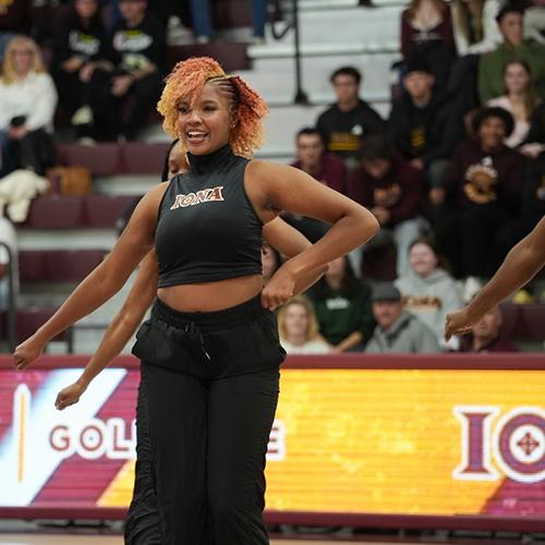Iona University Gold Line dancing in Maroon Madness.