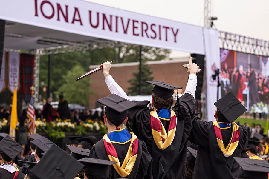 Grads cheer during Commencement.
