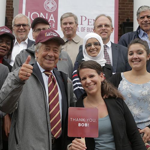 Robert LaPenta gives the thumbs up at the LaPenta School of Business building ceremony.
