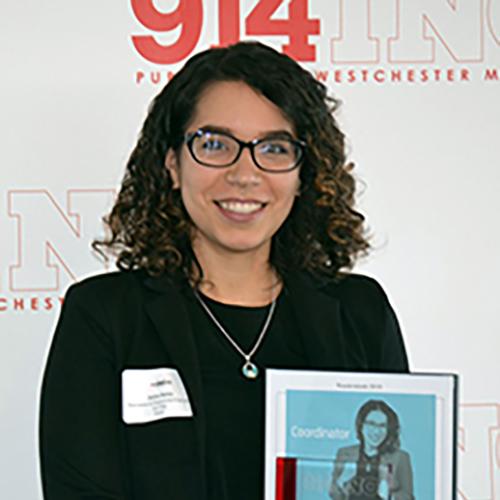 Jarlyne Batista holding her 914Inc Wunderkids award in 2019.