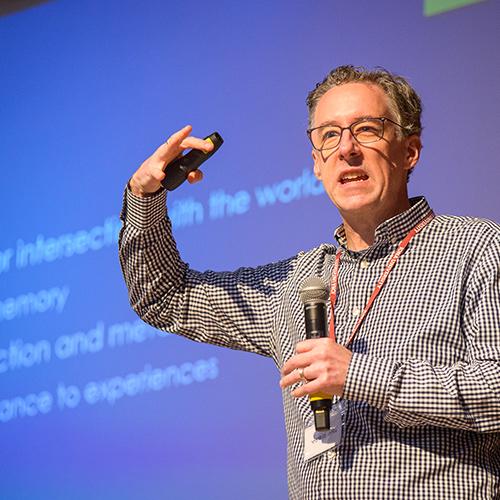 John Warner presenting at the conference. 