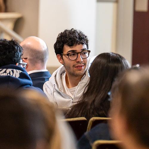Lucas Quintana listens and engages in discussion with fellow students during the 2026 Student Leadership Conference.