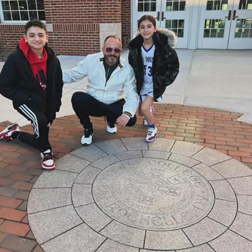 Mark Saracino with his two kids.