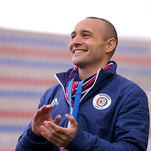 Matt Rizzetta in his soccer team's jacket.