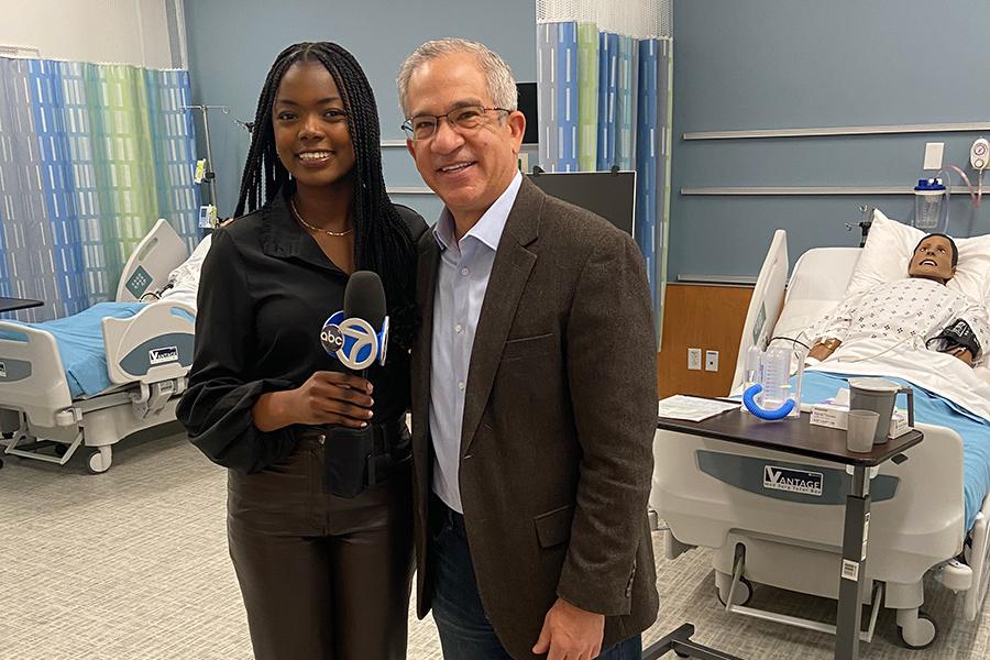 ABC’s Joe Torres interviews Molly Guillaume ’25 in the Kelly Center for Health Sciences.