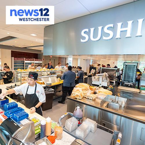 The sushi station in the dining hall with the News12 logo.