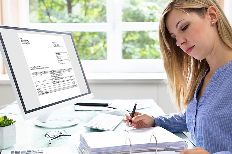 A student works on her online MBA at home.