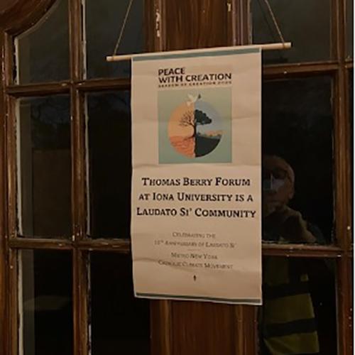 Peace with creation Thomas Barry Forum signage poster.