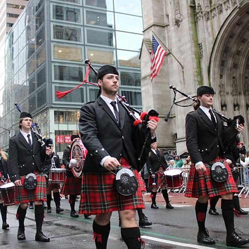 The Pipers march up Fifth Avenue in NYC.