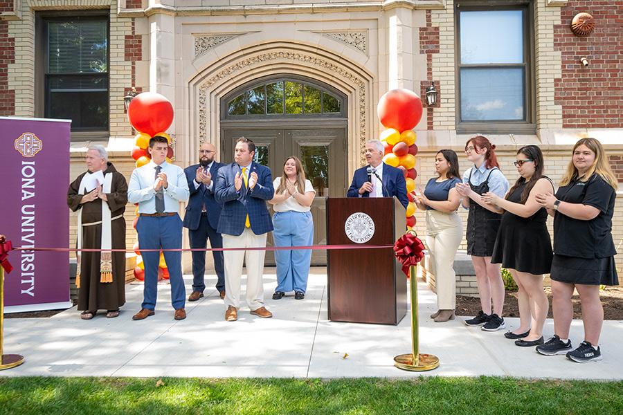 President Carey speaking at the Bohm Hall ribbon cutting.