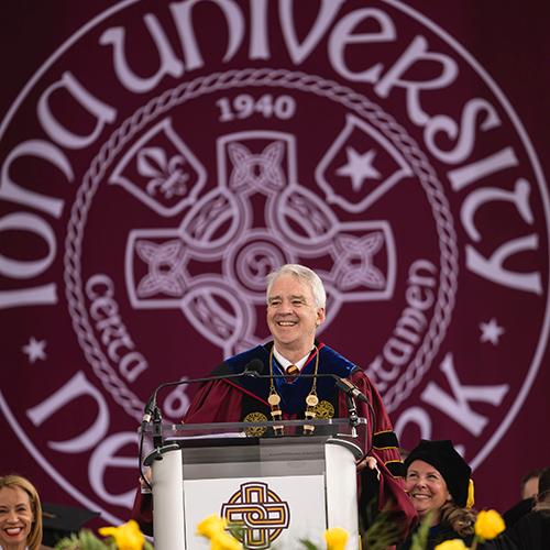 President Carey speaking at the 2025 Commencement Ceremony.