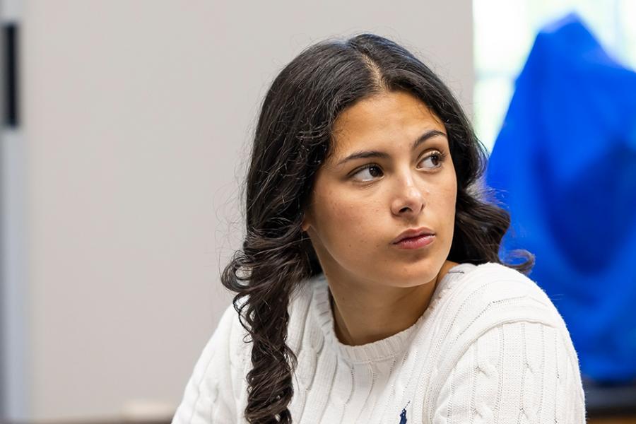 A student in the public health minor in the biology lab.