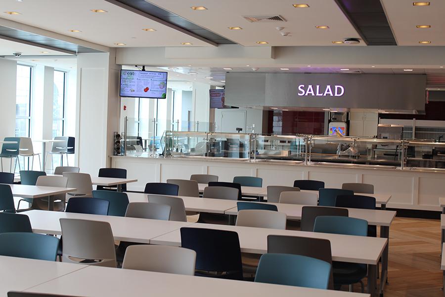 Tables and the salad station in the LSU dining hall.
