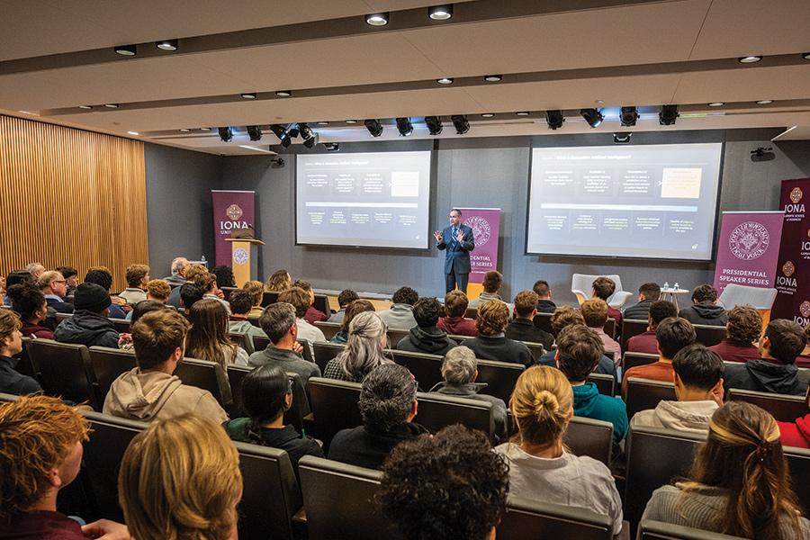 Jeffrey Saviano speaking in Henry Hall.
