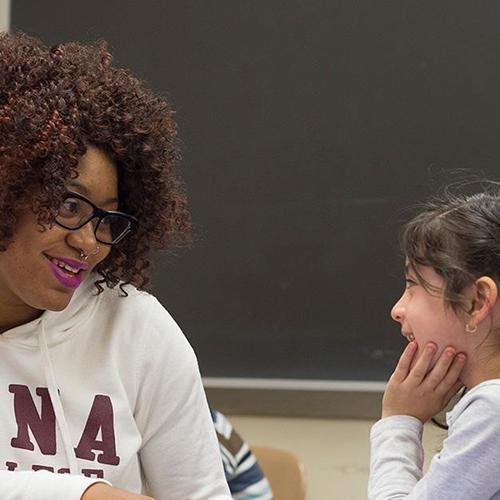 A school psychologist works with a young student.