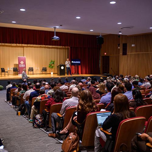 John Warner speakers to a full room at the conference.