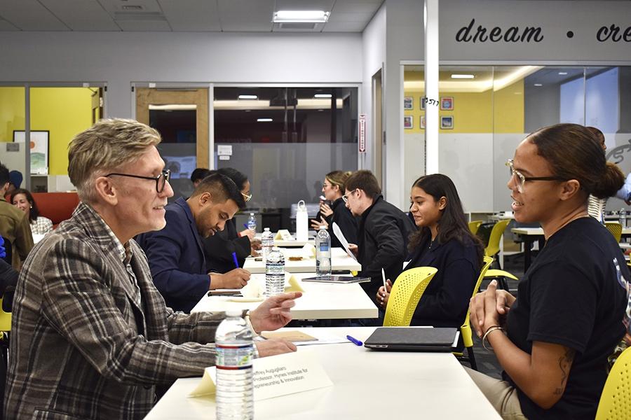 Students engaging mentors and with their amazing ideas.