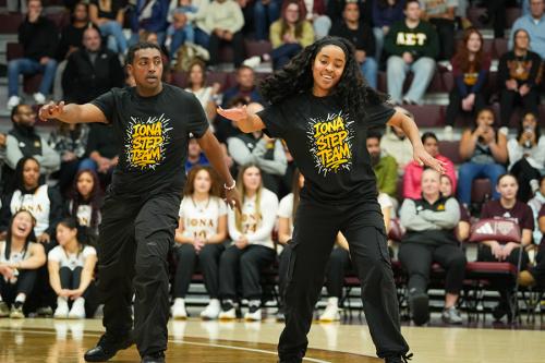 Two members of the Iona step team performing.