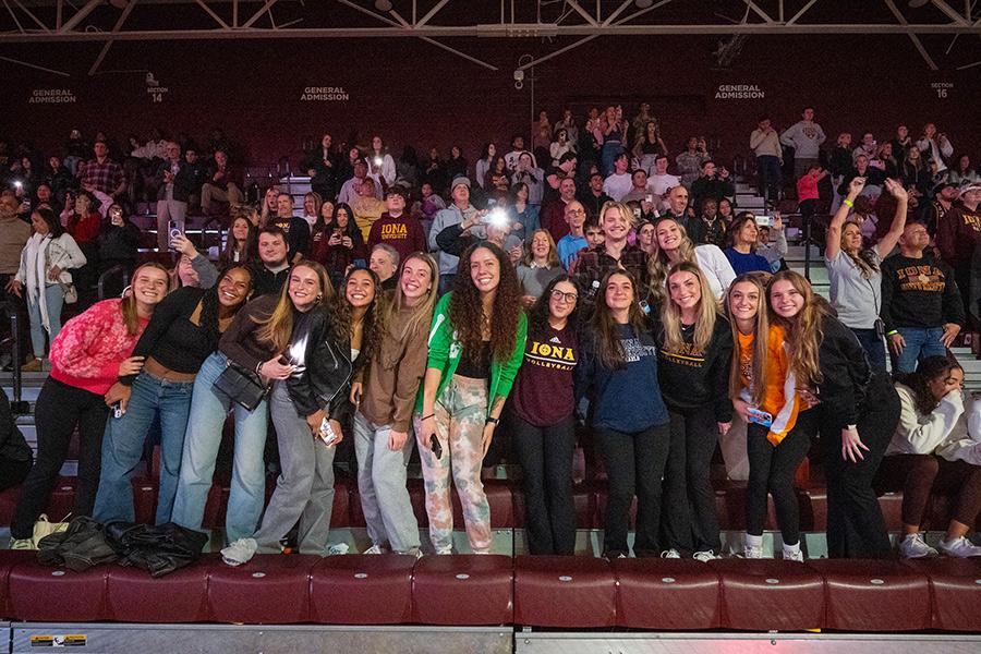 The student section cheering at a home basketball game.
