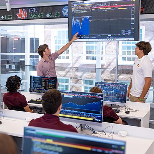 Students work on the trading floor.