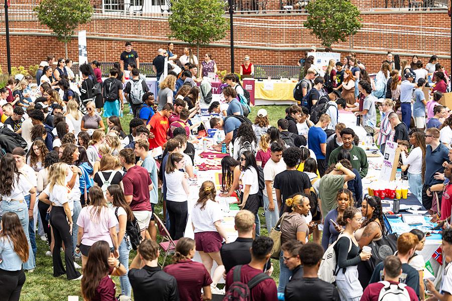Rows of tables at the involvement fair.