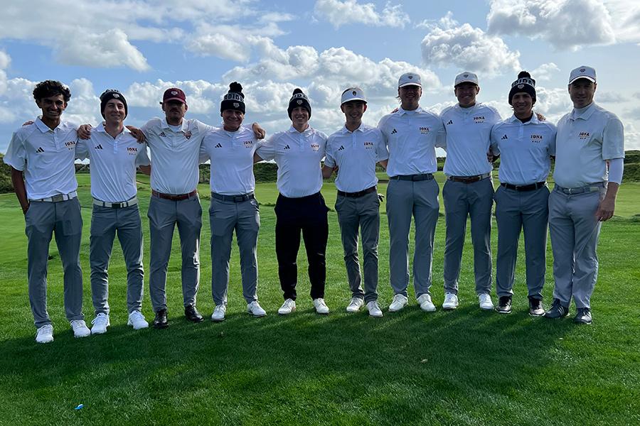 The golf team on a course on a sunny day.