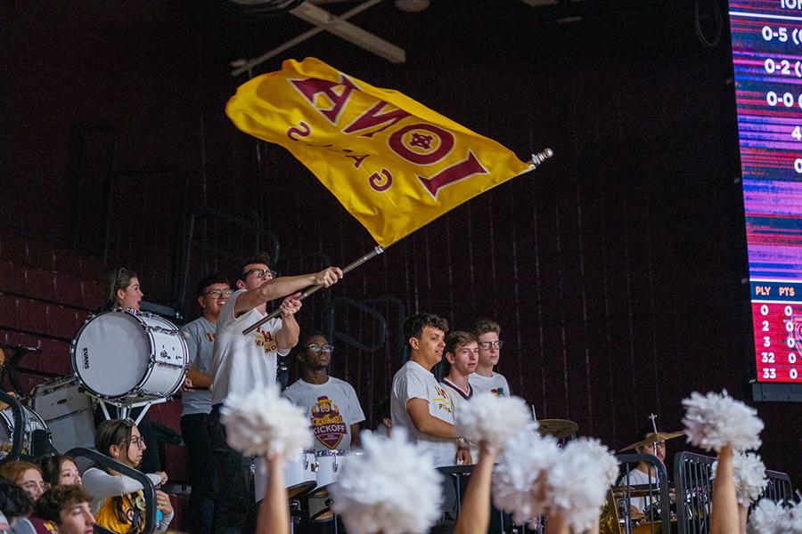 The Pep Band waves the Iona flag at a home game.